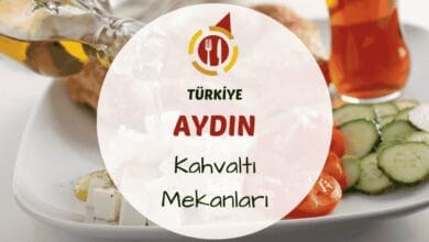 Aydın kahvaltı mekanlarını gösteren zeytin ağaçları altında kurulmuş serpme kahvaltı masası görseli