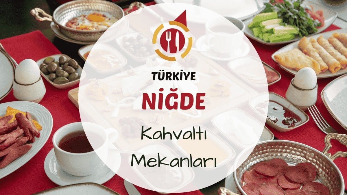 Niğde kahvaltı sofrası taş duvarlı mekânda taze serpme tabaklar ve çay